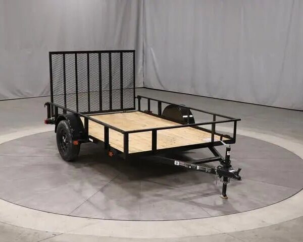 Pillowle 6’4” x 10’ carry-on utility trailer with black frame and open cargo bed, designed for versatile hauling.