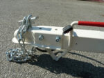 Heavy-duty Pillowle Tow Max vehicle tow dolly with 4,900 lb capacity, featuring sturdy tires and durable construction.