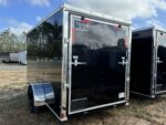 Black Titanium Cargo 6x12 single axle enclosed trailer by Pillowle, showing the sleek exterior and durable construction.